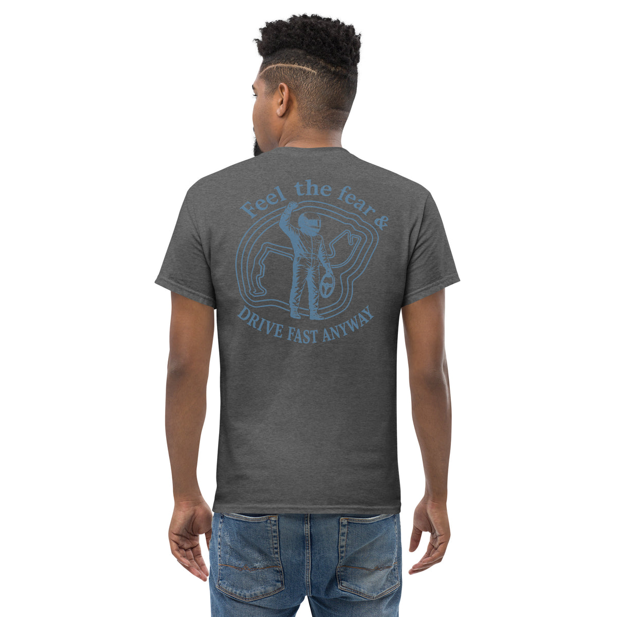 Dark Heather Feel the Fear back print tee worn from behind, badge centred between the shoulder blades