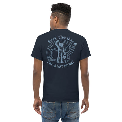 Navy Feel the Fear back print tee worn from behind, helmeted driver with fist raised