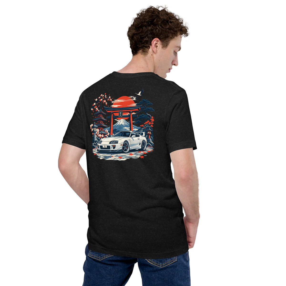 Black Heather A80 back print tee worn from behind, cherry blossom and pine framing the scene
