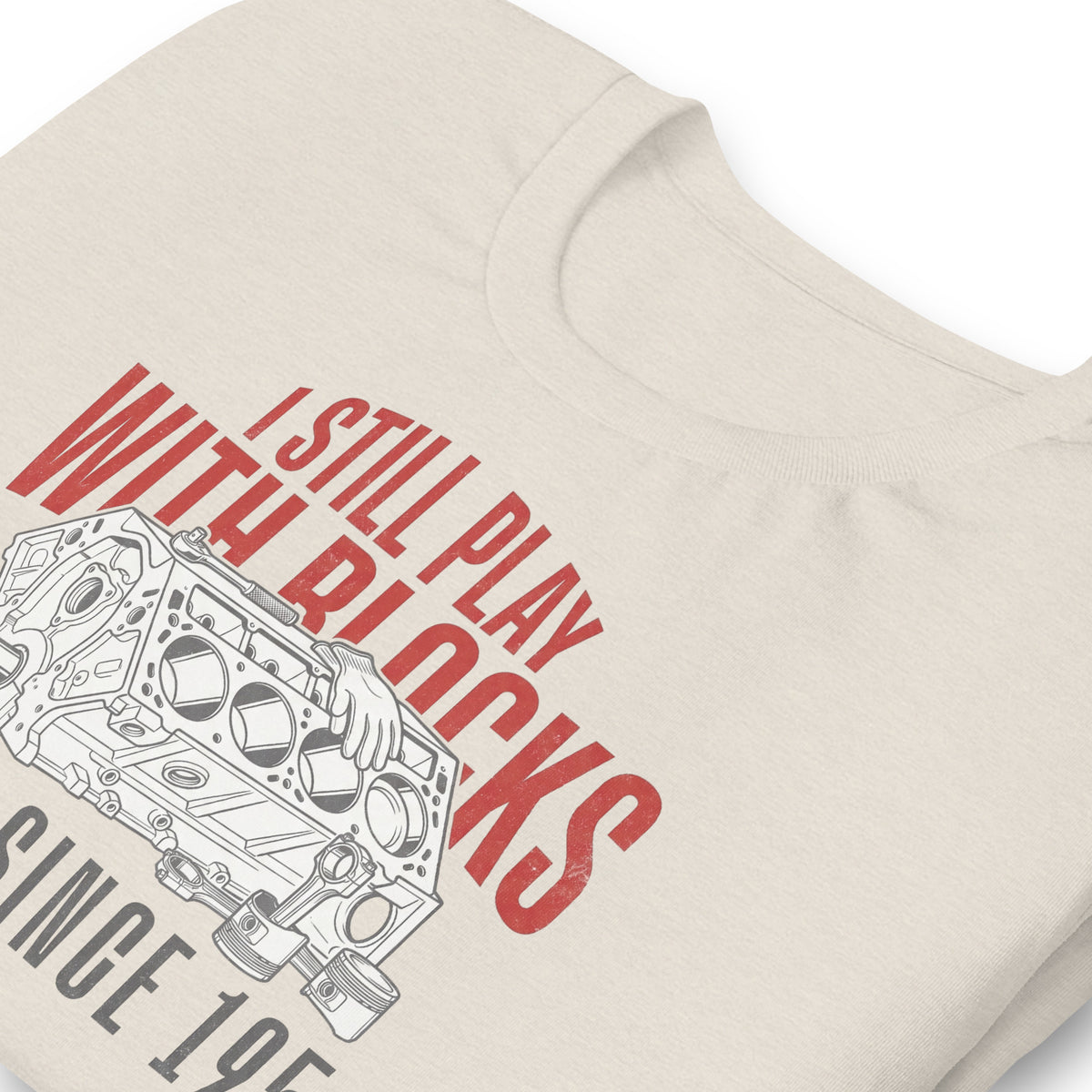I Still Play With Blocks Tee, Heather Dust — front print detail, engine block line art, Marque automotive apparel